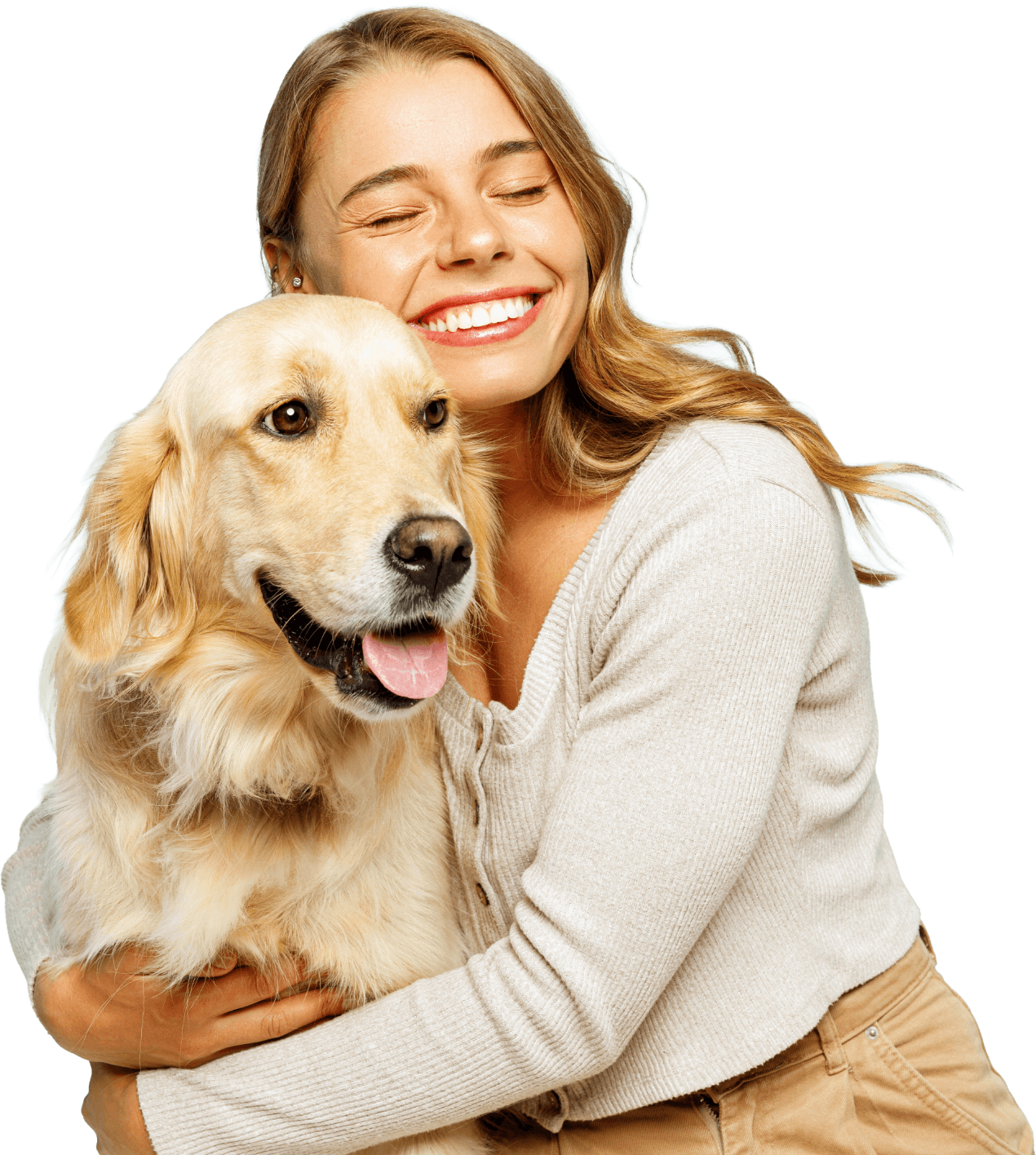 Smiling woman hugging a golden retriever dog