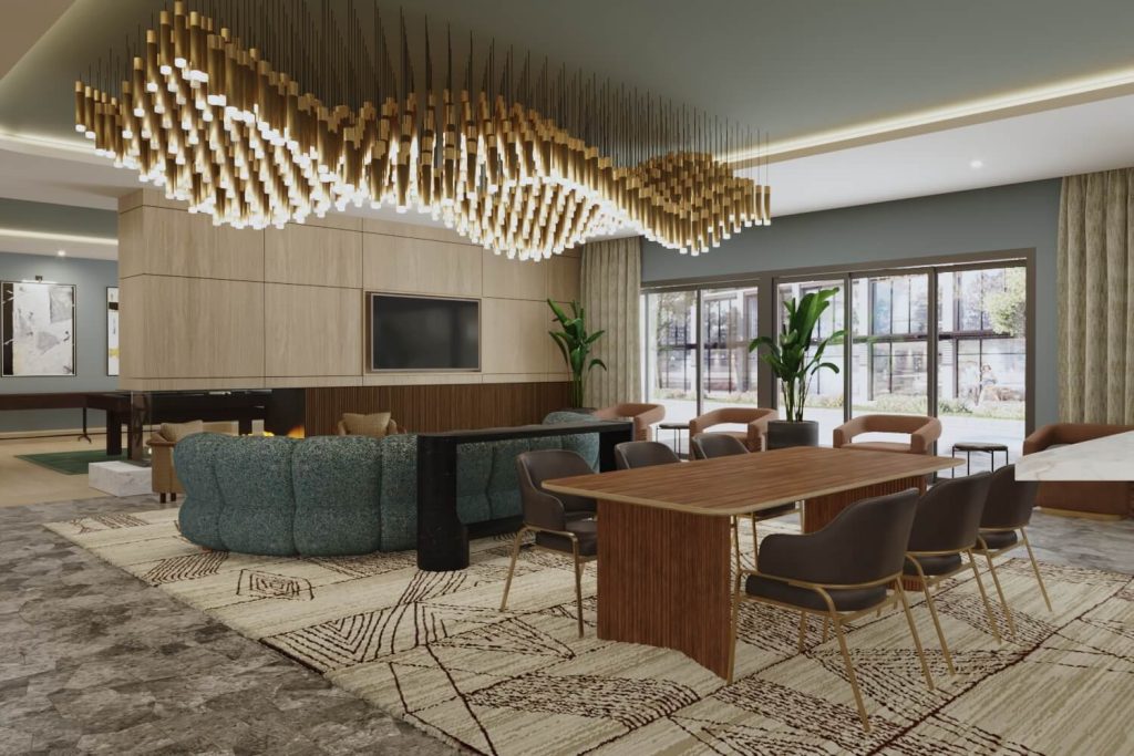 Club room at The Winn at Golden Valley with lounge seating, modern chandelier, and dining table