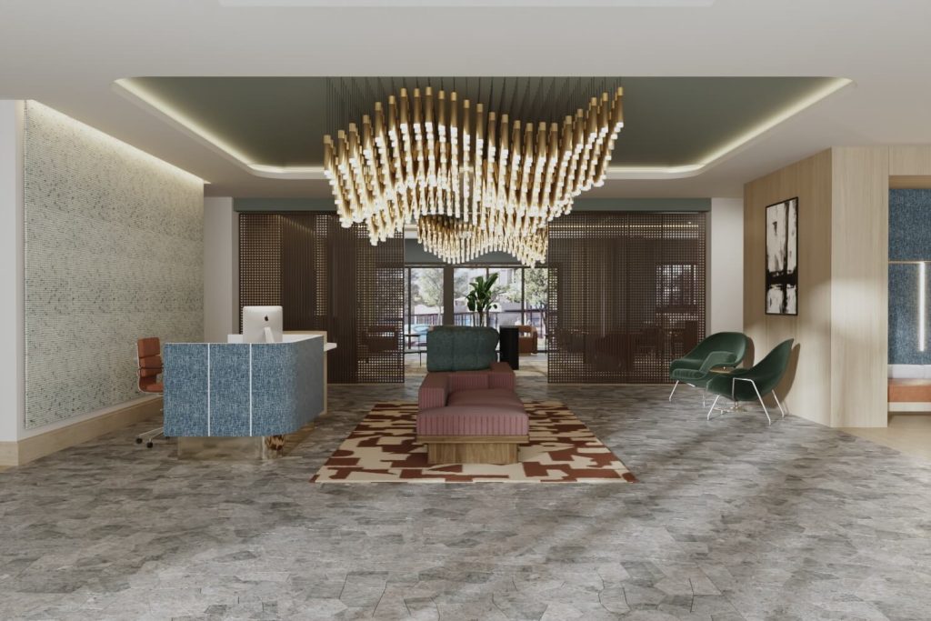 Lobby at The Winn at Golden Valley featuring a modern chandelier, reception desk, and lounge seating