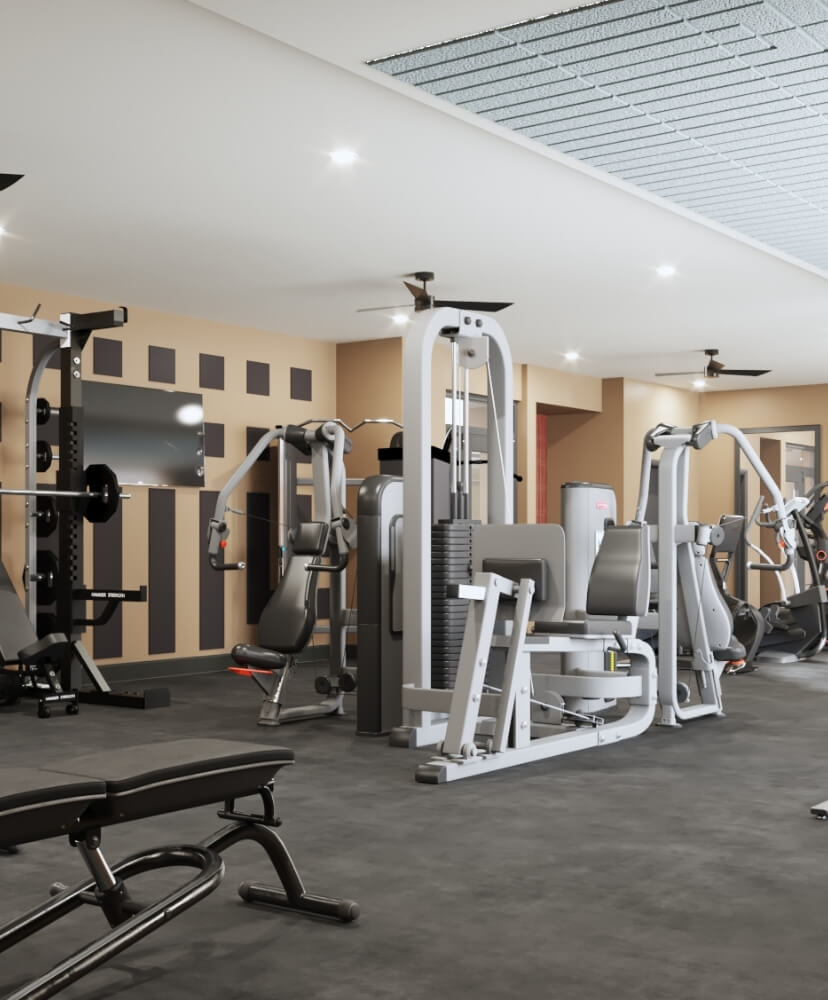 Apartment fitness center with weight machines, benches, and cardio equipment