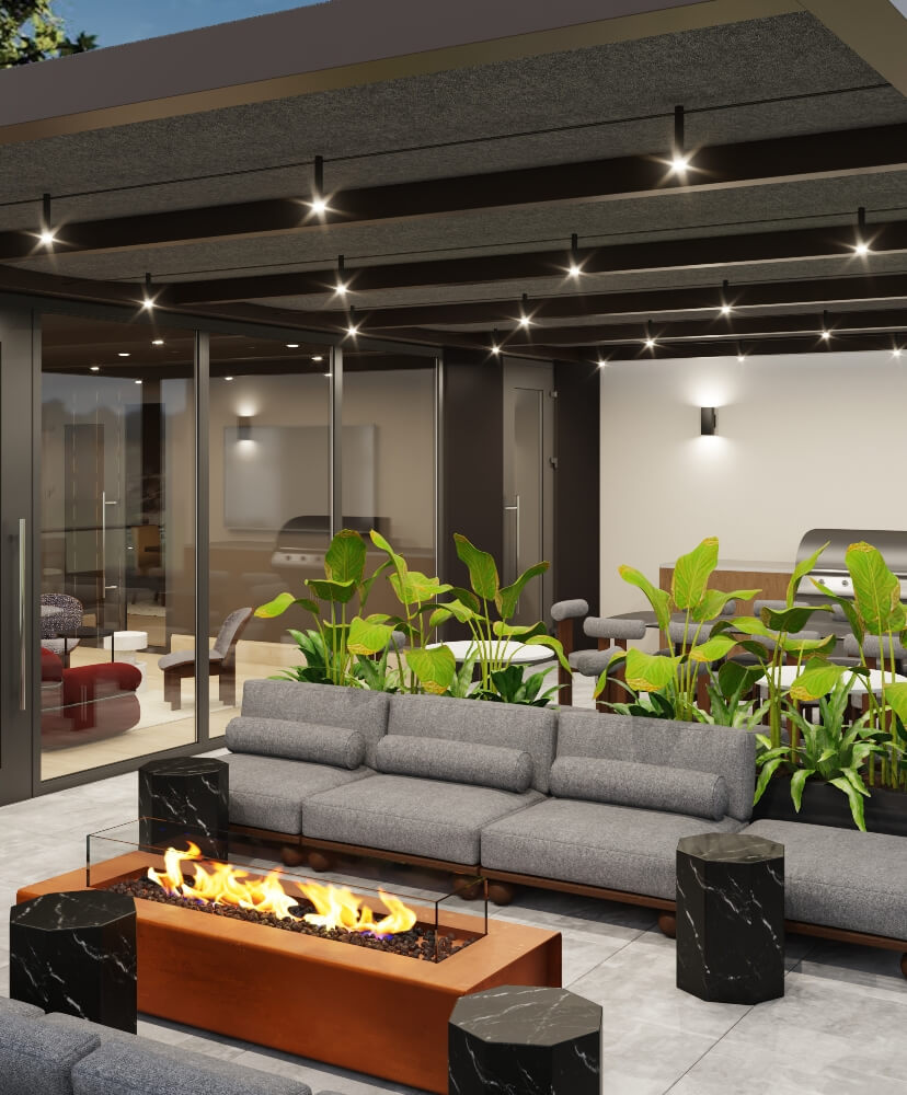 Apartment community sky lounge outdoor terrace with seating, fire feature, and covered patio