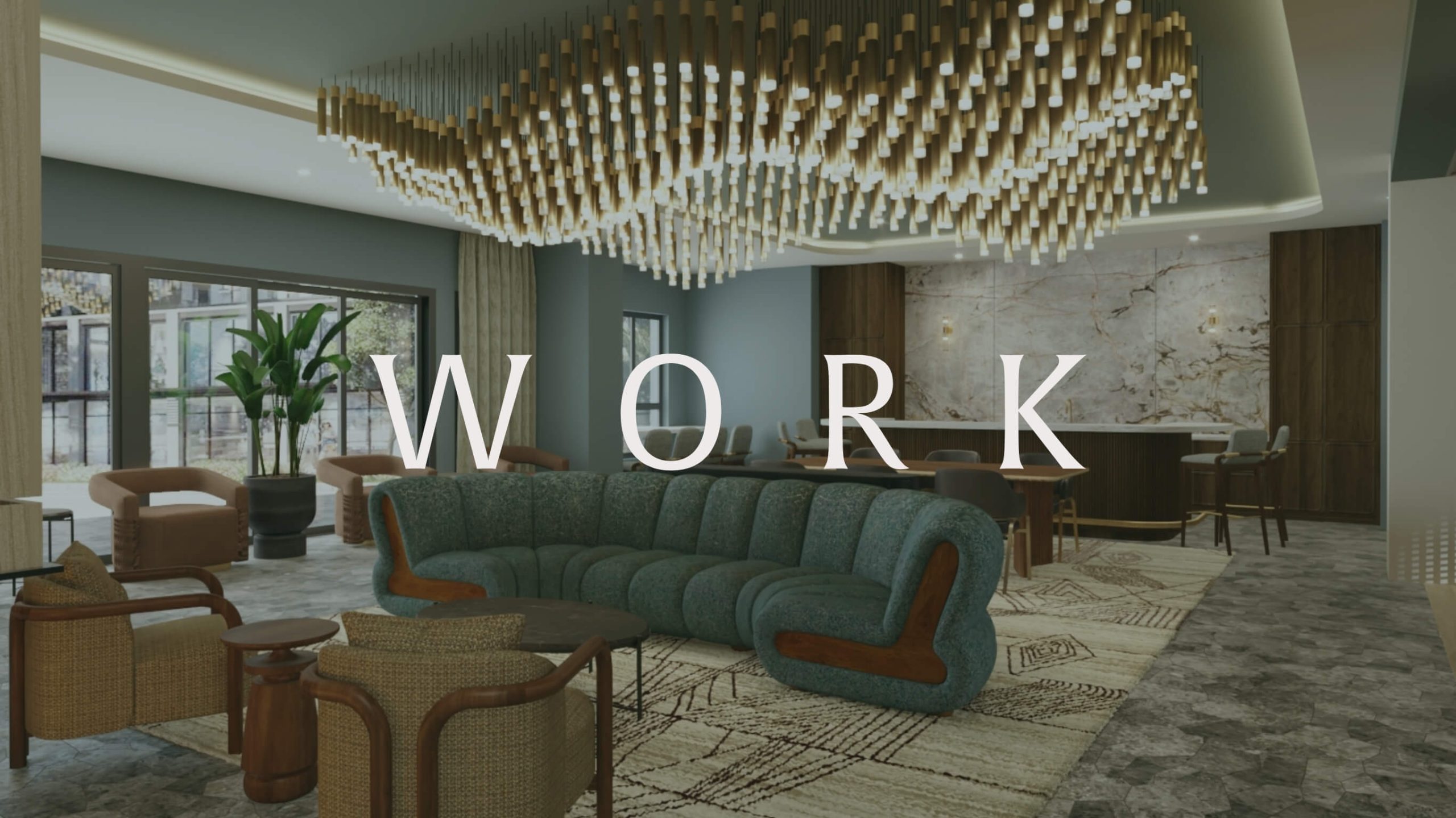 Apartment community workspace and lounge with seating and chandelier featuring the word Work