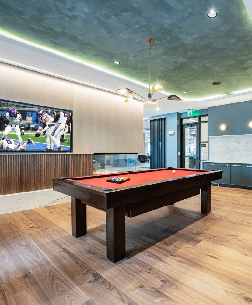 billiards table in a game room.