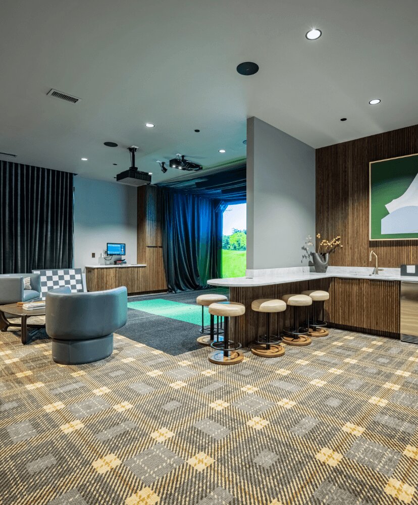 golf simulator within a game/activities room.